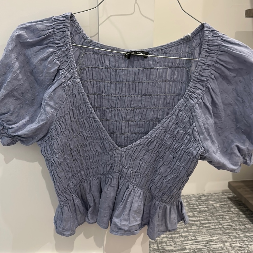 Blue crop top with puff sleeves